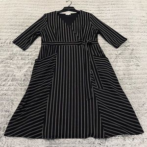 Kiyonna | faux wrap dress with pockets | black with white pinstripes